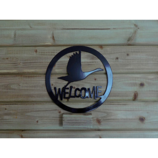 Round flying swan welcome metal wall art in black finish