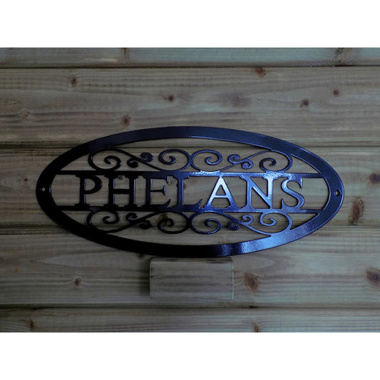 black metal oval custom name sign phelens made in ireland