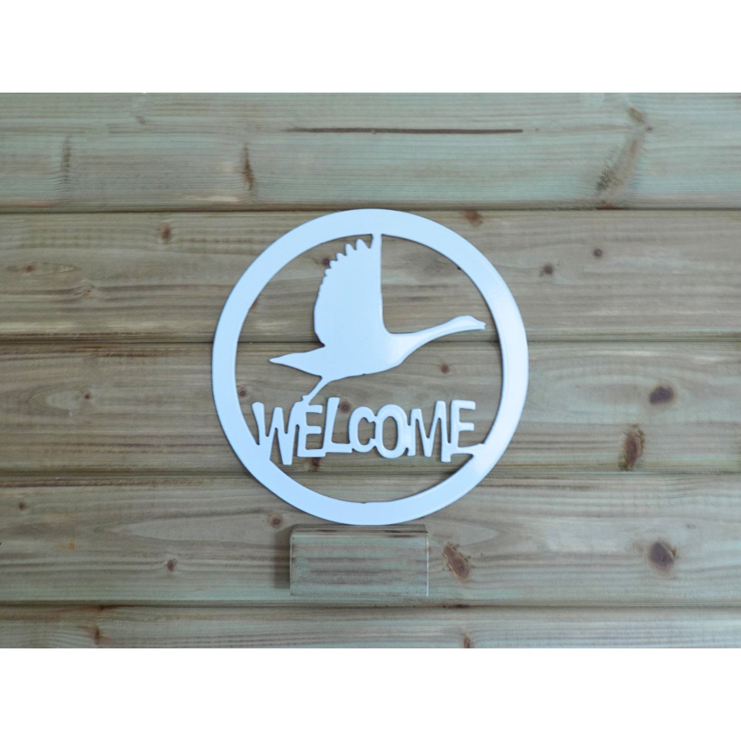 Round flying swan welcome metal wall art in white finish