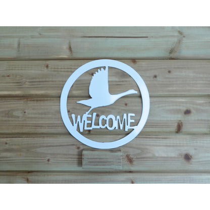 Round flying swan welcome metal wall art in white finish