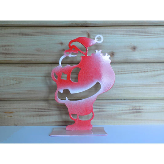 Handcrafted metal Santa ornament in glossy red with white frosted details, holding a sack, Irish-made durable Christmas decoration.