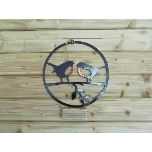 Round metal robin wall art with two robins on a branch, handmade in Ireland, available in red/black finish