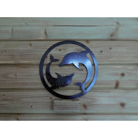 Two dolphins round metal wall art in black/gold
